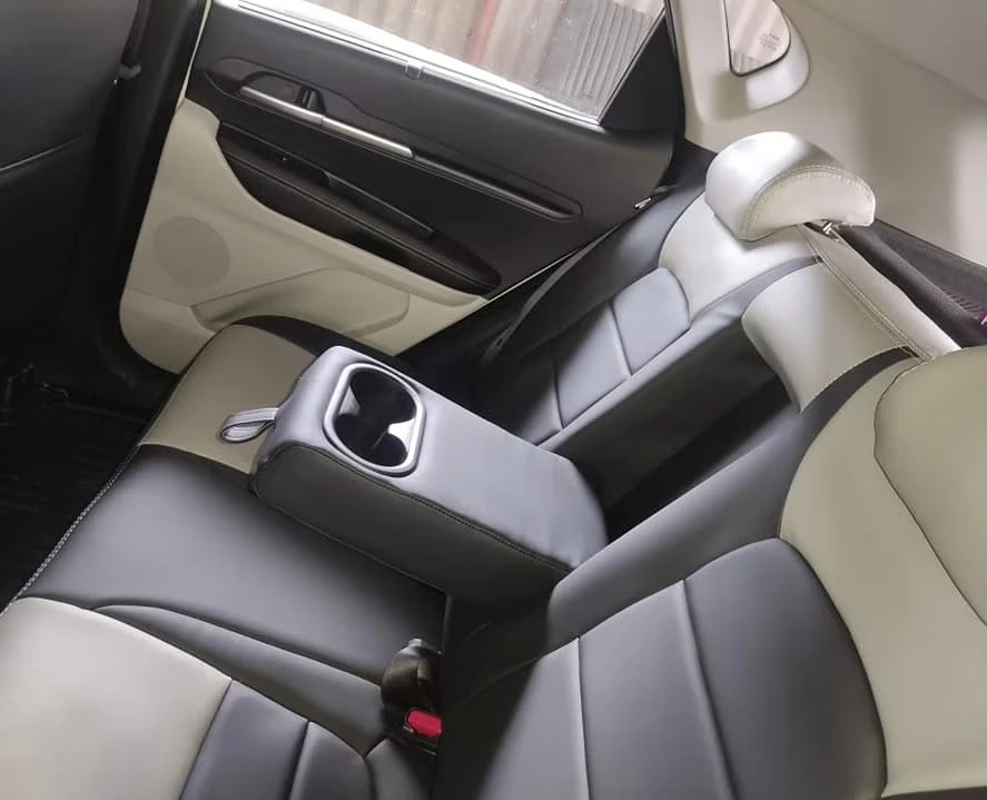 Black and cream rear seat upholstery